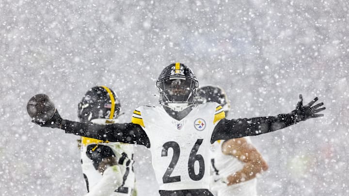 Nov 21, 2024; Cleveland, Ohio, USA; Pittsburgh Steelers cornerback Donte Jackson (26) celebrates following an interception against the Cleveland Browns during the fourth quarter at Huntington Bank Field Stadium. Mandatory Credit: Scott Galvin-Imagn Images