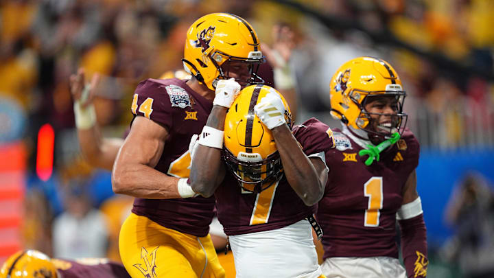 Jan 1, 2025; Atlanta, GA, USA; Arizona State Sun Devils linebacker Keyshaun Elliott (44), defensive back Shamari Simmons (7), and defensive back Keith Abney II (1) celebrate after a safety against the Texas Longhorns during the second half of the Peach Bowl at Mercedes-Benz Stadium. Mandatory Credit: Dale Zanine-Imagn Images