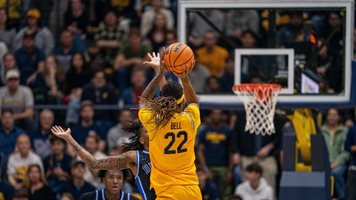 Jan 14, 2026; Berkeley, California, USA; California Golden Bears forward Chris Bell (22) shoots the baseball against the Duke Blue Devils during the first half at Haas Pavilion. Mandatory Credit: Neville E. Guard-Imagn Images