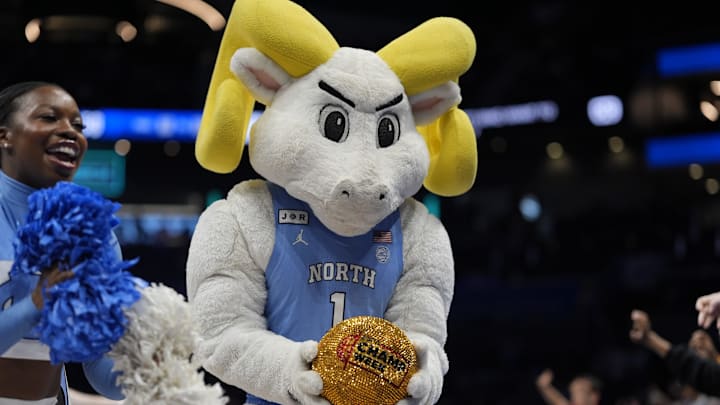 Mar 12, 2025; Charlotte, NC, USA; North Carolina Tar Heels mascot Ramses holds onto the ESPN Camp Week ball during the second half against the Notre Dame Fighting Irish at Spectrum Center. Mandatory Credit: Jim Dedmon-Imagn Images