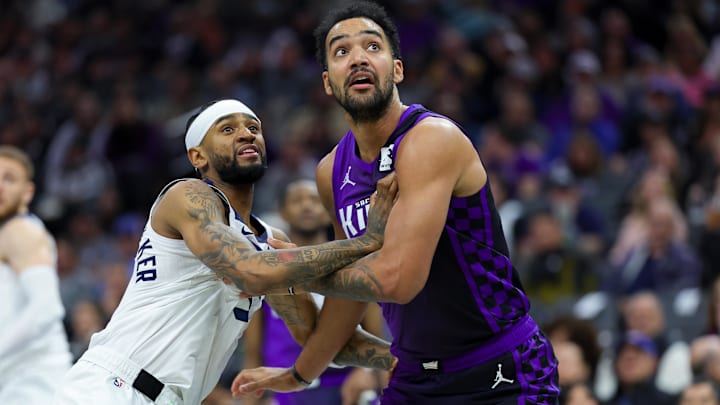 Sacramento Kings forward Trey Lyles, right, and Minnesota Timberwolves guard Nickeil Alexander-Walker fight for a rebound at Golden 1 Center in Sacramento, Calif., on Nov. 15, 2024. Sacramento Kings forward Trey Lyles, right, and Minnesota Timberwolves guard Nickeil Alexander-Walker fight for a rebound at Golden 1 Center in Sacramento, Calif., on Nov. 15, 2024.