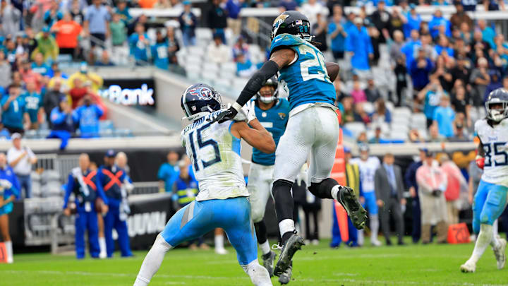 Jacksonville Jaguars safety Antonio Johnson (26) breaks up a pass intended for Tennessee Titans wide receiver Nick Westbrook-Ikhine (15) during the fourth quarter Sunday, Dec. 29, 2024 at EverBank Stadium in Jacksonville, Fla. The Jaguars held off the Titans 20-13. [Corey Perrine/Florida Times-Union]