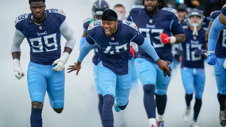 Tennessee Titans linebacker Arden Key (49) runs onto the field before the Titans play the Bengals at Nissan Stadium in Nashville, Tenn., Sunday, Dec. 15, 2024. Tennessee Titans linebacker Arden Key (49) runs onto the field before the Titans play the Bengals at Nissan Stadium in Nashville, Tenn., Sunday, Dec. 15, 2024.