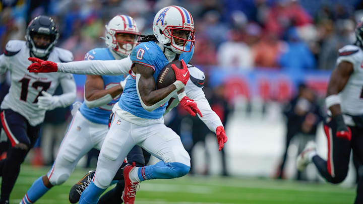Tennessee Titans wide receiver Calvin Ridley runs after the catch against the Houston Texans during the second quarter at Nissan Stadium in Nashville, Tenn.