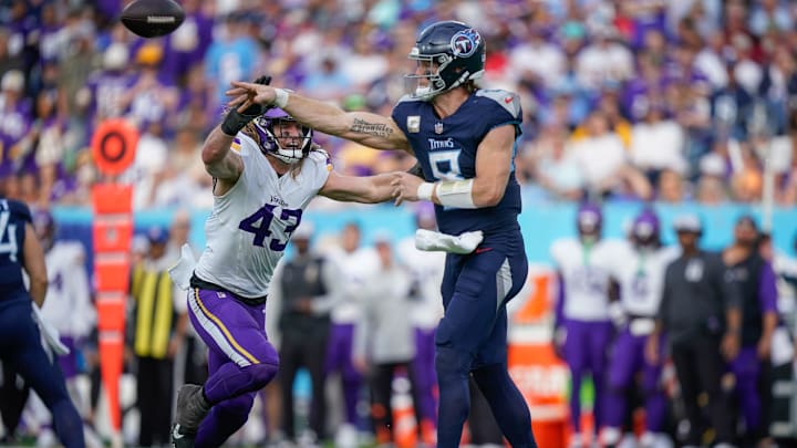 Tennessee Titans quarterback Will Levis (8) gets the pass away before Minnesota Vikings linebacker Andrew Van Ginkel (43) can get to him in the fourth quarter at Nissan Stadium in Nashville, Tenn., Sunday, Nov. 17, 2024.