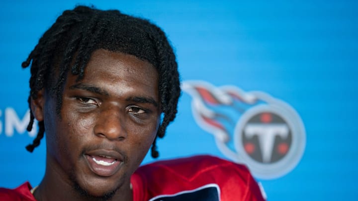 Tennessee Titans quarterback Cam Ward fields questions from the media after practice during training camp.