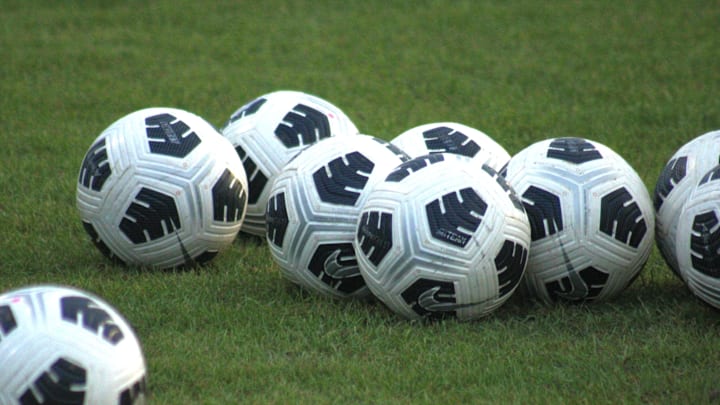 STOCK | Soccer balls rest on a field before an FHSAA Region 1-7A high school boys soccer playoff between Mandarin and Orlando Boone in Jacksonville, Florida on February 13, 2024. [Clayton Freeman/Florida Times-Union]