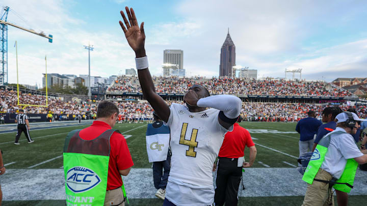 Nov 9, 2024; Atlanta, Georgia, USA; Georgia Tech Yellow Jackets wide receiver Abdul Janneh Jr. (4) celebrates on the sideline against the Miami Hurricanes in the fourth quarter at Bobby Dodd Stadium at Hyundai Field. Mandatory Credit: Brett Davis-Imagn Images Nov 9, 2024; Atlanta, Georgia, USA; Georgia Tech Yellow Jackets wide receiver Abdul Janneh Jr. (4) celebrates on the sideline against the Miami Hurricanes in the fourth quarter at Bobby Dodd Stadium at Hyundai Field. Mandatory Credit: Brett Davis-Imagn Images