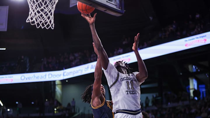 Feb 15, 2025; Atlanta, Georgia, USA; Georgia Tech Yellow Jackets forward Baye Ndongo (11) shoots against the California Golden Bears in the second half at McCamish Pavilion. Mandatory Credit: Brett Davis-Imagn Images