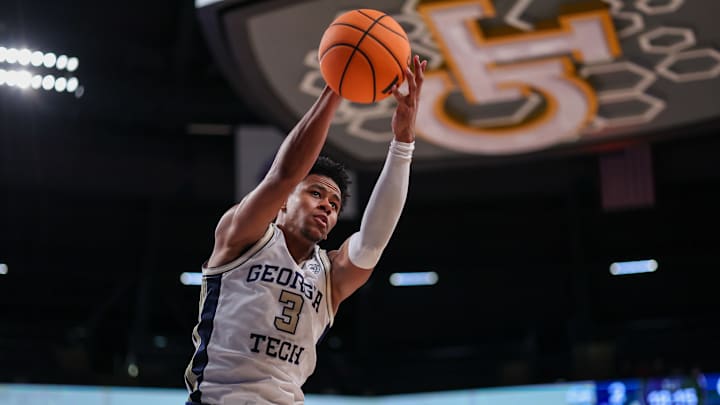 Jan 14, 2026; Atlanta, Georgia, USA; Georgia Tech Yellow Jackets guard Jaeden Mustaf (3) grabs a rebound against the Pittsburgh Panthers in the first half at McCamish Pavilion. Mandatory Credit: Brett Davis-Imagn Images