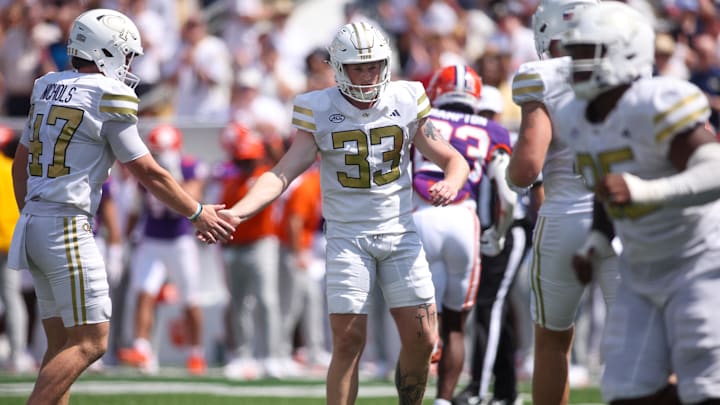 Sep 13, 2025; Atlanta, Georgia, USA; Georgia Tech Yellow Jackets place kicker Aidan Birr (33) celebrates after a field goal against the Clemson Tigers in the second quarter at Bobby Dodd Stadium at Hyundai Field. Mandatory Credit: Brett Davis-Imagn Images