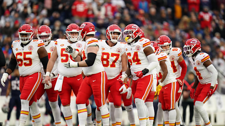 Dec 17, 2023; Foxborough, Massachusetts, USA; Kansas City Chiefs tight end Travis Kelce (87) and offensive line on the field against the New England Patriots in the first quarter at Gillette Stadium. Mandatory Credit: David Butler II-Imagn Images