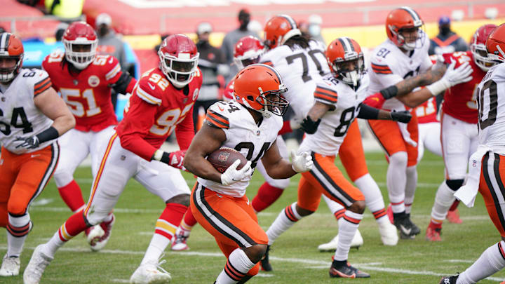 Jan 17, 2021; Kansas City, Missouri, USA; Cleveland Browns running back Nick Chubb (24) runs the ball against the Kansas City Chiefs during the first half in the AFC Divisional Round playoff game at Arrowhead Stadium. Mandatory Credit: Denny Medley-Imagn Images