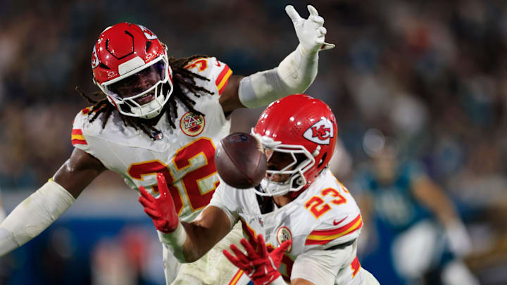 Kansas City Chiefs linebacker Nick Bolton (32) and linebacker Drue Tranquill (23) can’t intercept a bobbled pass during the second quarter of an NFL football matchup at EverBank Stadium, Monday, Oct. 6, 2025, in Jacksonville, Fla. [Corey Perrine/Florida Times-Union]