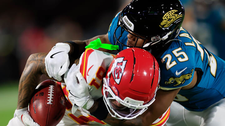 Jacksonville Jaguars safety Rayuan Lane III (25) tackles Kansas City Chiefs wide receiver Nikko Remigio (81) on a punt return during the first quarter of an NFL football matchup at EverBank Stadium, Monday, Oct. 6, 2025, in Jacksonville, Fla. The Jacksonville Jaguars edged the Kansas City Chiefs 31-28. [Corey Perrine/Florida Times-Union]
