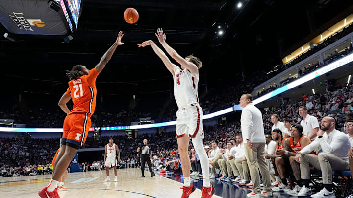 Nov 20, 2024; Birmingham, AL, USA; Illinois forward Morez Johnson Jr. (21) defends a three pointer by Alabama forward Grant Nelson (4) in the CM Newton Classic at Legacy Arena. Mandatory Credit: Gary Cosby Jr.-Tuscaloosa News