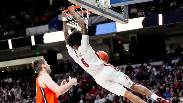 Nov 20, 2024; Birmingham, AL, USA; Alabama guard Labaron Philon (0) gets a dunk with Illinois center Tomislav Ivisic (13) trailing in the CM Newton Classic at Legacy Arena. Alabama defeated Illinois 100-87. Mandatory Credit: Gary Cosby Jr.-Tuscaloosa News Nov 20, 2024; Birmingham, AL, USA; Alabama guard Labaron Philon (0) gets a dunk with Illinois center Tomislav Ivisic (13) trailing in the CM Newton Classic at Legacy Arena. Alabama defeated Illinois 100-87. Mandatory Credit: Gary Cosby Jr.-Tuscaloosa News