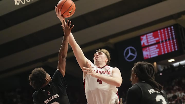 Feb 25, 2025; Tuscaloosa, AL, USA; Alabama forward Grant Nelson (4) shoots in the lane over Mississippi State guard Dellquan Warren (6) at Coleman Coliseum. Mandatory Credit: Gary Cosby Jr./USA TODAY Network via Imagn Images Feb 25, 2025; Tuscaloosa, AL, USA; Alabama forward Grant Nelson (4) shoots in the lane over Mississippi State guard Dellquan Warren (6) at Coleman Coliseum. Mandatory Credit: Gary Cosby Jr./USA TODAY Network via Imagn Images