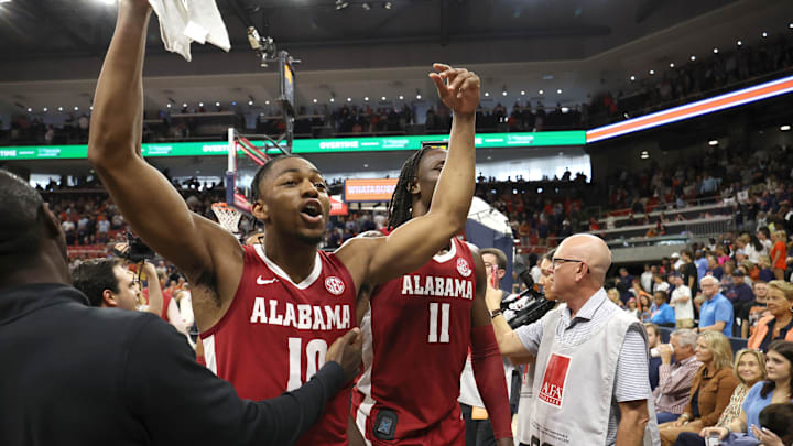Mar 8, 2025; Auburn, Alabama, USA; Alabama Crimson Tide forward Mouhamed Dioubate (10) celebrates after the Crimson Tide beat the Auburn Tigers in overtime at Neville Arena. Mandatory Credit: John Reed-Imagn Images