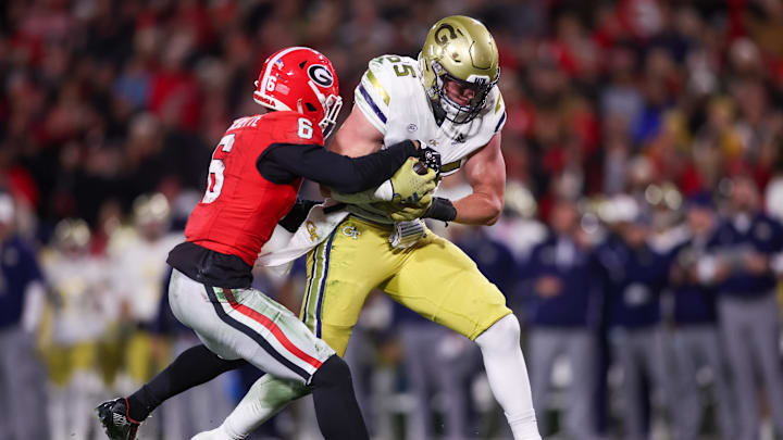 Nov 29, 2024; Athens, Georgia, USA; Georgia Bulldogs defensive back Daylen Everette (6) tackles Georgia Tech Yellow Jackets tight end Jackson Hawes (85) in the second quarter Nov 29, 2024; Athens, Georgia, USA; Georgia Bulldogs defensive back Daylen Everette (6) tackles Georgia Tech Yellow Jackets tight end Jackson Hawes (85) in the second quarter