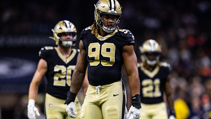 Aug 23, 2025; New Orleans, Louisiana, USA; New Orleans Saints defensive end Chase Young (99) looks on against the Denver Broncos