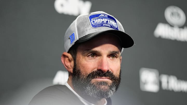 Dec 6, 2025; Charlotte, NC, USA; Duke Blue Devils head coach Manny Diaz looks on after the game against the Virginia Cavaliers during the 2025 ACC Championship game at Bank of America Stadium. Mandatory Credit: Jim Dedmon-Imagn Images