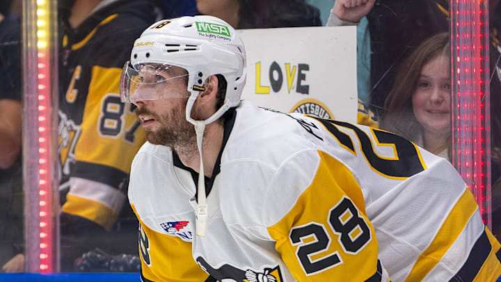 Oct 26, 2024; Vancouver, British Columbia, CAN; Pittsburgh Penguins defenseman Marcus Pettersson (28) rests during warm up prior to a game against the Vancouver Canucks at Rogers Arena. Mandatory Credit: Bob Frid-Imagn Images