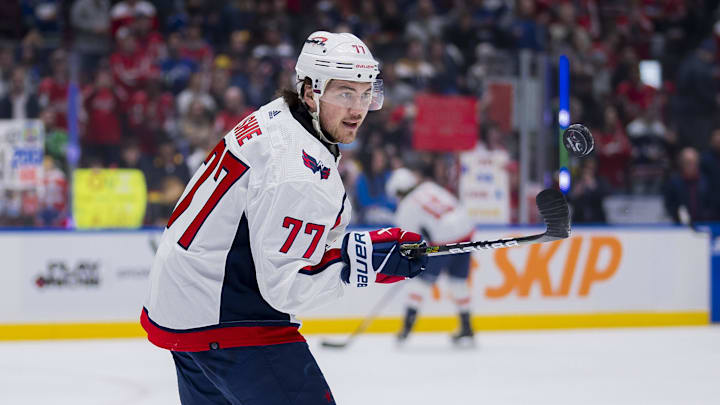 Mar 16, 2024; Vancouver, British Columbia, CAN; Washington Capitals forward TJ Oshie (77) handles the puck during warm up prior to a game against the Vancouver Canucks at Rogers Arena.  Mandatory Credit: Bob Frid-Imagn Images
