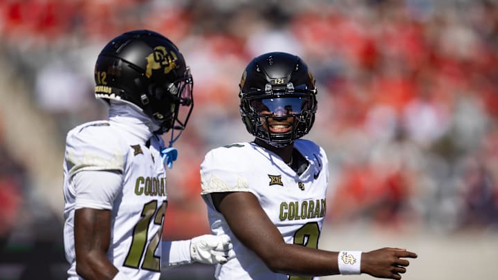 Oct 19, 2024; Tucson, Arizona, USA; Colorado Buffalos quarterback Shedeur Sanders (2) with wide receiver Travis Hunter (12) against the Arizona Wildcats at Arizona Stadium. Mandatory Credit: Mark J. Rebilas-Imagn Images