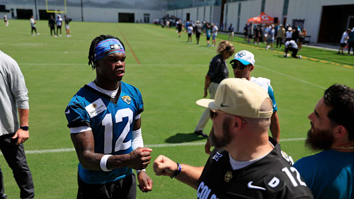 Jacksonville Jaguars wide receiver Travis Hunter (12) greets fans during the second mandatory minicamp at Miller Electric Center Wednesday, June 11, 2025 in Jacksonville, Fla.