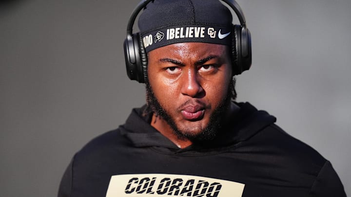 Nov 16, 2024; Boulder, Colorado, USA; Colorado Buffaloes offensive tackle Jordan Seaton (77) before the game against the Utah Utes at Folsom Field. Nov 16, 2024; Boulder, Colorado, USA; Colorado Buffaloes offensive tackle Jordan Seaton (77) before the game against the Utah Utes at Folsom Field.