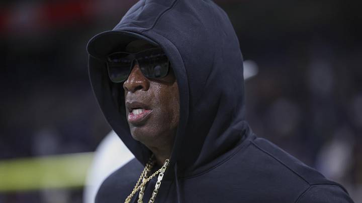 Dec 28, 2024; San Antonio, TX, USA; Colorado Buffaloes head coach Deion Sanders jogs on the field before the game against the Brigham Young Cougars at Alamodome. Mandatory Credit: Troy Taormina-Imagn Images