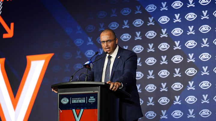Jul 22, 2025; Charlotte, NC, USA; Virginia head coach Tony Elliott answers questions from the media during ACC Media Days at Hilton Charlotte Uptown. Mandatory Credit: Jim Dedmon-Imagn Images