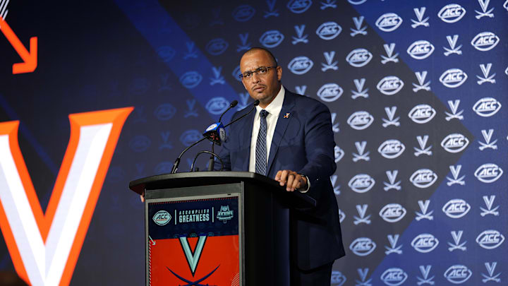 Jul 22, 2025; Charlotte, NC, USA; Virginia head coach Tony Elliott answers questions from the media during ACC Media Days at Hilton Charlotte Uptown. Mandatory Credit: Jim Dedmon-Imagn Images