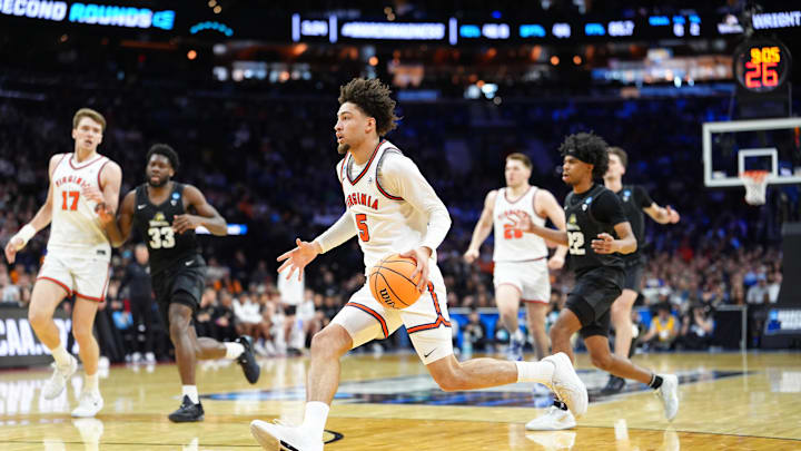 Mar 20, 2026; Philadelphia, PA, USA; Virginia Cavaliers guard Sam Lewis (5) drives to the basket during the second half against the Wright State Raiders during a first round game of the men's 2026 NCAA Tournament at Xfinity Mobile Arena. Mandatory Credit: Kyle Ross-Imagn Images