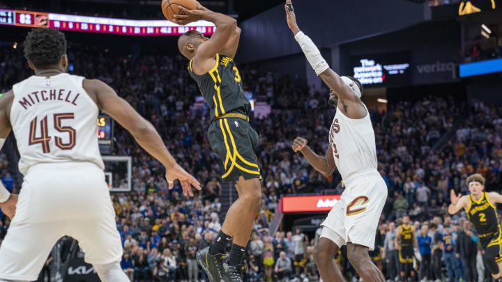 Nov 11, 2023; San Francisco, California, USA;  Golden State Warriors guard Chris Paul (3) shoot the ball against Cleveland Cavaliers guard Caris LeVert (3) during the third quarter at Chase Center. Mandatory Credit: Neville E. Guard-USA TODAY Sports