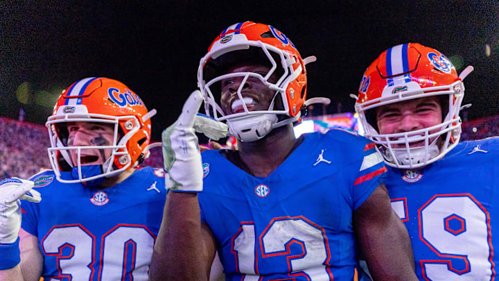 Gainesville, Florida, USA; Florida Gators running back Jadan Baugh (13) celebrates his touchdown during the fourth quarter against the Florida State Seminoles at Ben Hill Griffin Stadium.