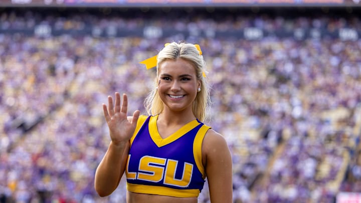 LSU Tigers cheerleader entertains the fans against the Arkansas Razorbacks.