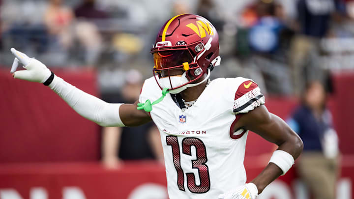 Sep 29, 2024; Glendale, Arizona, USA; Washington Commanders cornerback Emmanuel Forbes Jr. (13) against the Arizona Cardinals at State Farm Stadium. Mandatory Credit: Mark J. Rebilas-Imagn Images