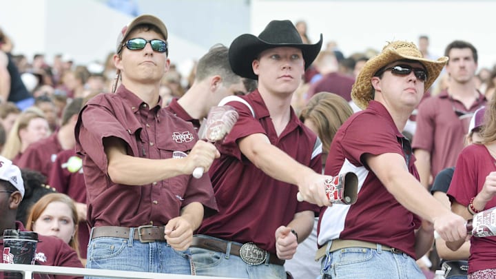 Mississippi State Bulldogs fans ring cowbells before the game against the LSU Tigers at Davis Wade Stadium.