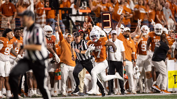 Texas Longhorns cornerback Jahdae Barron intercepts a pass in the third quarter against the Georgia Bulldogs