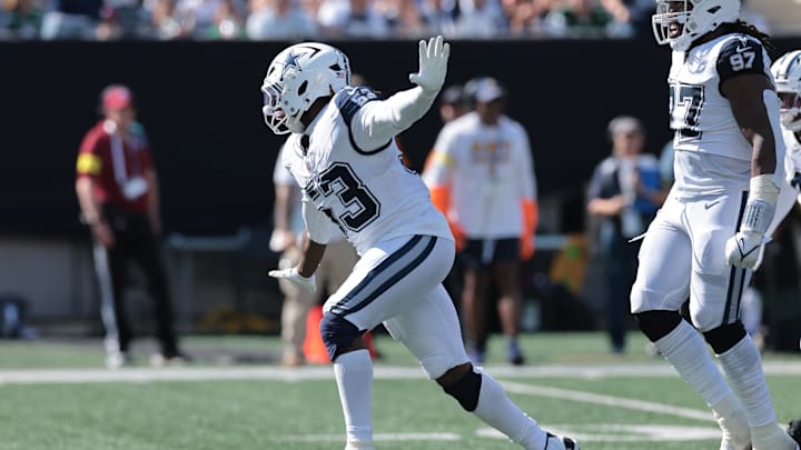 Dallas Cowboys defensive end James Houston reacts after a sack against the New York Jets.