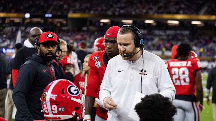Jan 9, 2023; Inglewood, CA, USA; Georgia Bulldogs co-defensive coordinator and linebackers coach Glenn Schumann against the TCU Horned Frogs during the CFP national championship game at SoFi Stadium. Mandatory Credit: Mark J. Rebilas-Imagn Images Jan 9, 2023; Inglewood, CA, USA; Georgia Bulldogs co-defensive coordinator and linebackers coach Glenn Schumann against the TCU Horned Frogs during the CFP national championship game at SoFi Stadium. Mandatory Credit: Mark J. Rebilas-Imagn Images