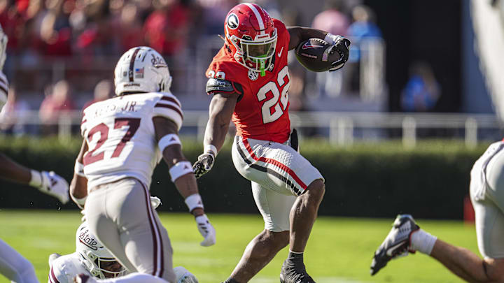 Oct 12, 2024; Athens, Georgia, USA; Georgia Bulldogs running back Branson Robinson (22) runs against the Mississippi State Bulldogs during the first half at Sanford Stadium. Mandatory Credit: Dale Zanine-Imagn Images Oct 12, 2024; Athens, Georgia, USA; Georgia Bulldogs running back Branson Robinson (22) runs against the Mississippi State Bulldogs during the first half at Sanford Stadium. Mandatory Credit: Dale Zanine-Imagn Images