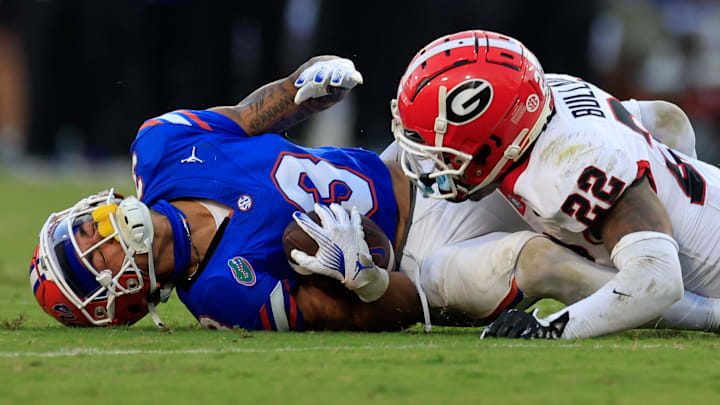 Florida Gators wide receiver Eugene Wilson III (3) is tackled by Georgia Bulldogs defensive back Javon Bullard (22) during the third quarter of an NCAA football game Saturday, Oct. 28, 2023 at EverBank Stadium in Jacksonville, Fla. Georgia defeated Florida 43-20. [Corey Perrine/Florida Times-Union]
