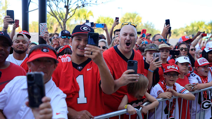 Georgia Bulldogs fans cheer as players arrive for the Dawg Walk before an NCAA college football matchup against the Florida Gators Saturday, Nov. 2, 2024 at EverBank Stadium in Jacksonville, Fla. [Corey Perrine/Florida Times-Union]
