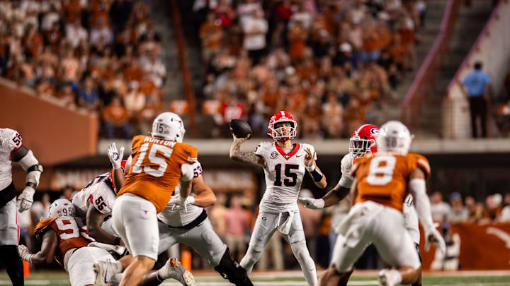Oct 19, 2024; Austin, Texas, USA; Georgia Bulldogs quarterback Carson Beck (15) drops back to pass in the first quarter against the Texas Longhorns at Darrell K Royal-Texas Memorial Stadium. Mandatory Credit: Brett Patzke-Imagn Images