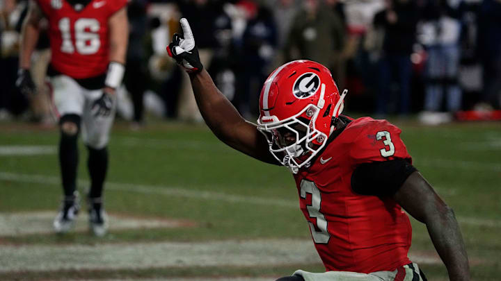 Georgia running back Nate Frazier (3) celebrates after driving in for the game winning score during overtime of a NCAA college football game against Georgia Tech in Athens, Ga., on Friday, Nov. 29, 2024. Georgia running back Nate Frazier (3) celebrates after driving in for the game winning score during overtime of a NCAA college football game against Georgia Tech in Athens, Ga., on Friday, Nov. 29, 2024.