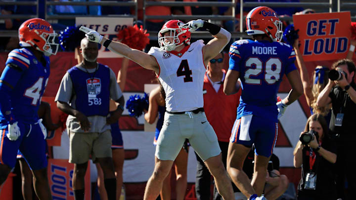 Georgia Bulldogs tight end Oscar Delp (4) indicates a first down pickup during the first quarter of an NCAA football game, Saturday, Nov. 1, 2025, at EverBank Stadium in Jacksonville, Fla. Georgia held off Florida 24-20. [Corey Perrine/Florida Times-Union]