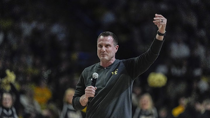 Jan 25, 2025; Winston-Salem, North Carolina, USA; New Wake Forest Demon Deacons football coach Jake Dickert speaks to the fans during the first half between the Wake Forest Demon Deacons and the Duke Blue Devils at Lawrence Joel Veterans Memorial Coliseum. Mandatory Credit: Jim Dedmon-Imagn Images